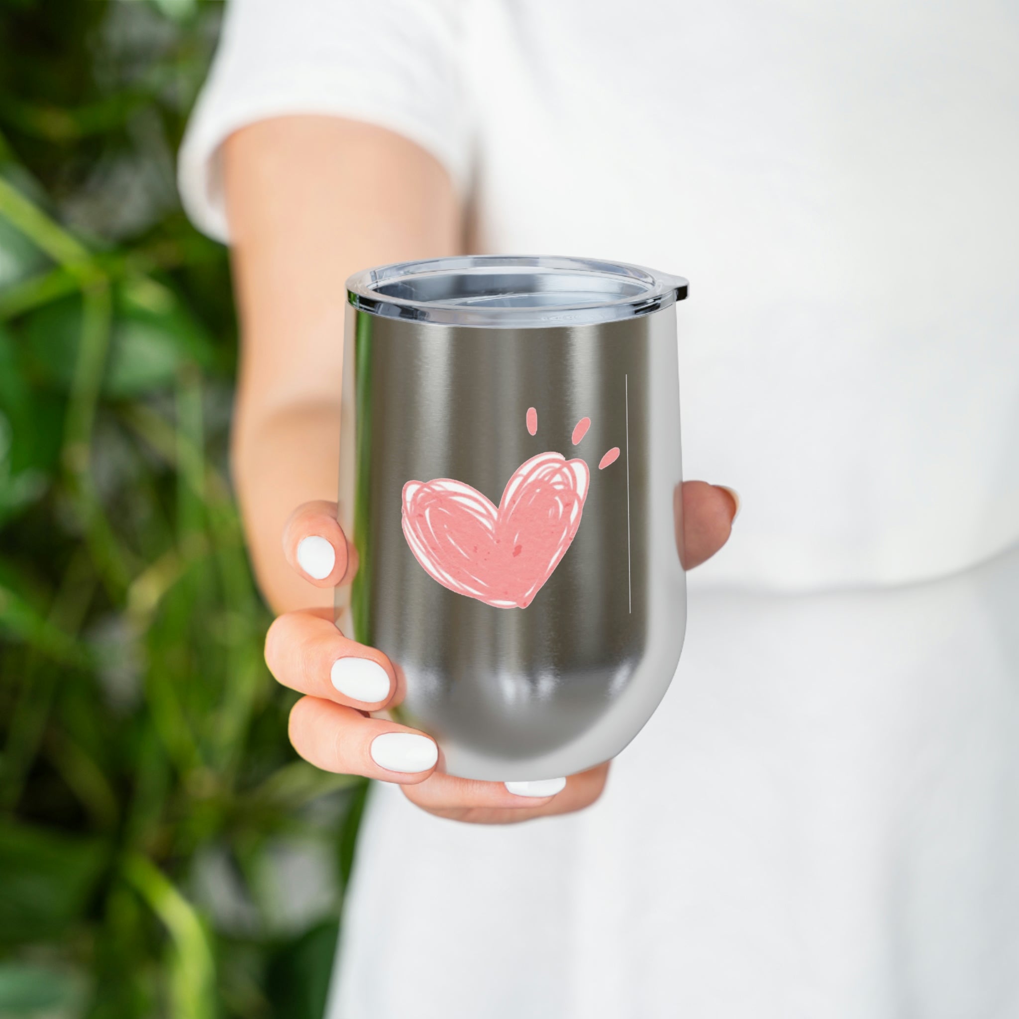 Hearts Wine Tumbler in stainless steel with a clear lid, showcasing a stylish design for hot and cold beverages.