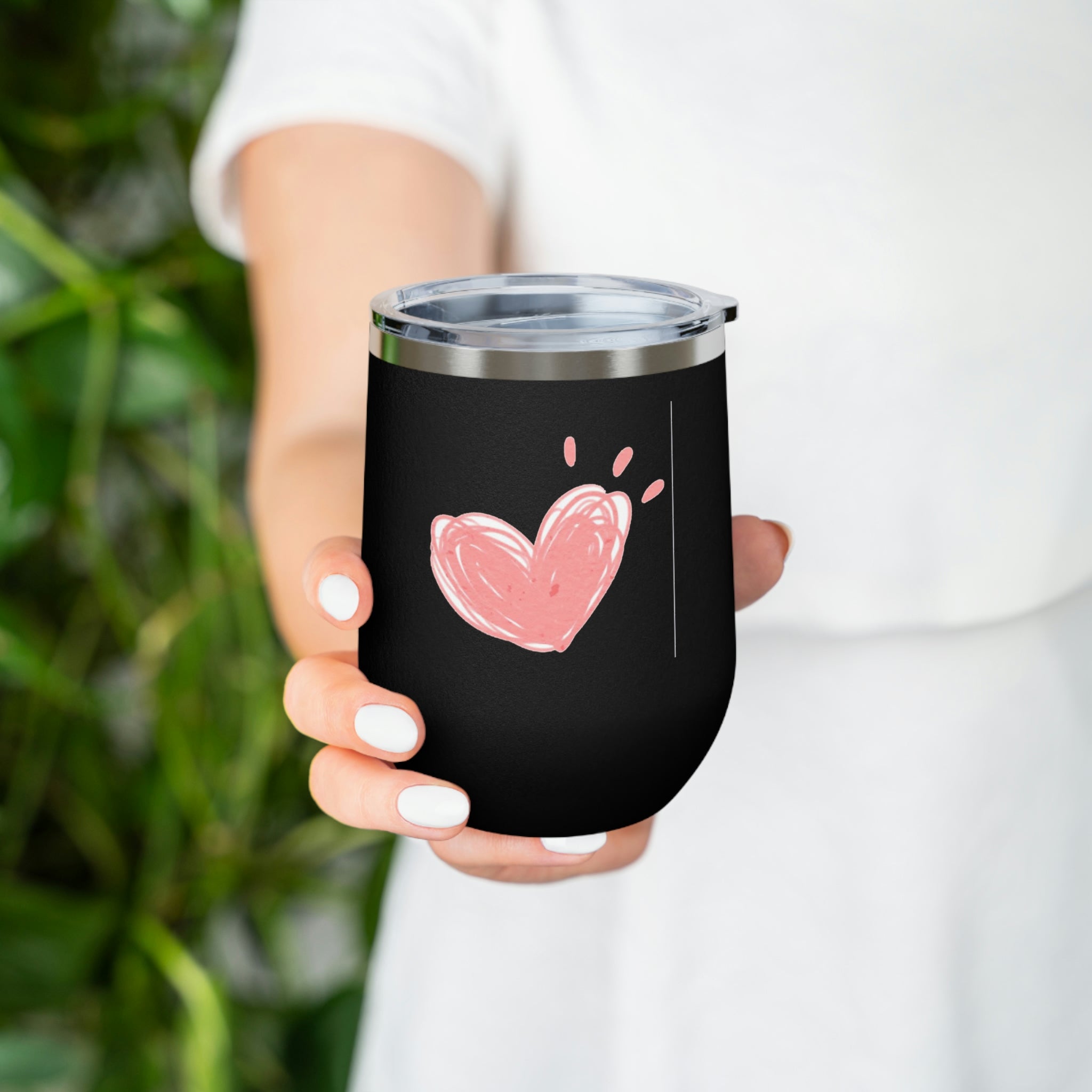 Hearts Wine Tumbler in stainless steel with a clear lid, showcasing a stylish design for hot and cold beverages.