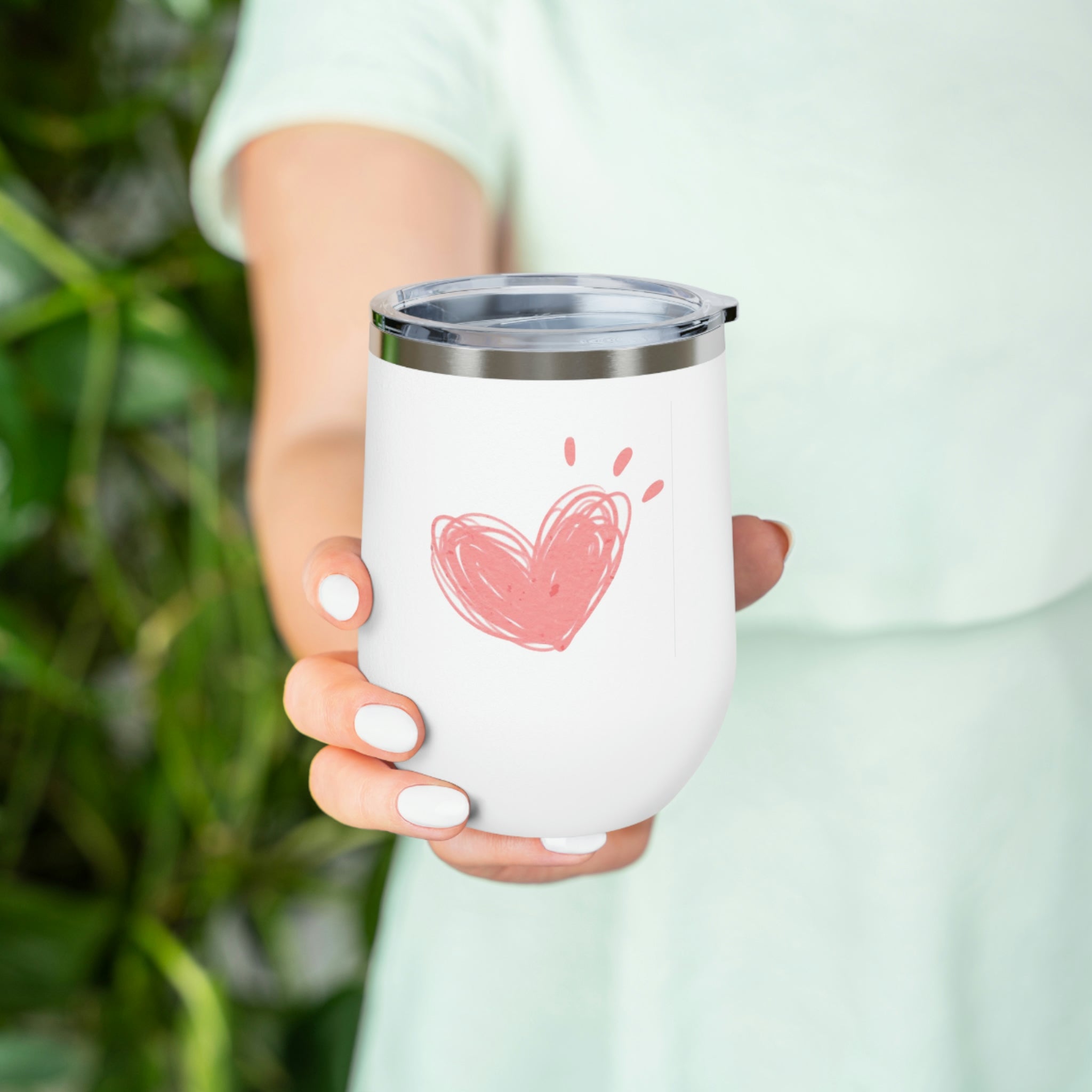 Hearts Wine Tumbler in stainless steel with a clear lid, showcasing a stylish design for hot and cold beverages.