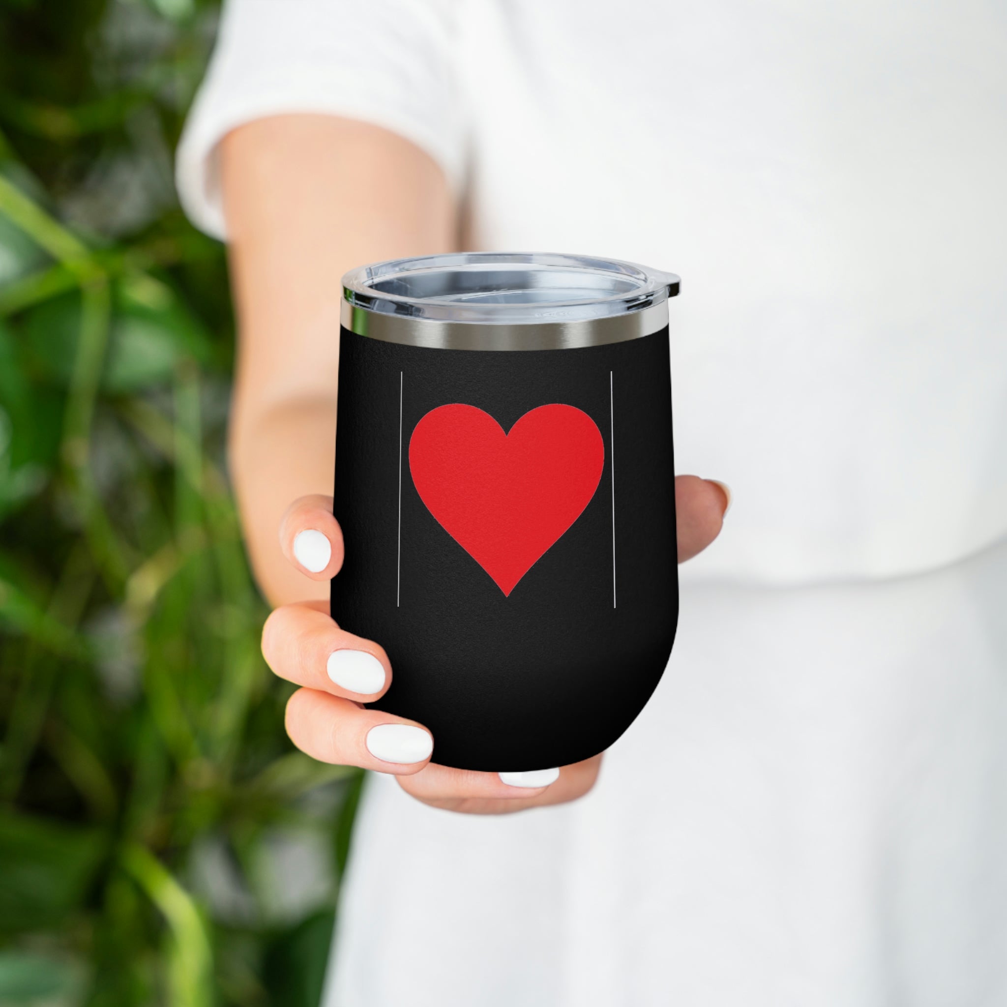 Hearts Wine Tumbler in stainless steel with a clear plastic lid, showcasing a stylish design perfect for hot and cold beverages.