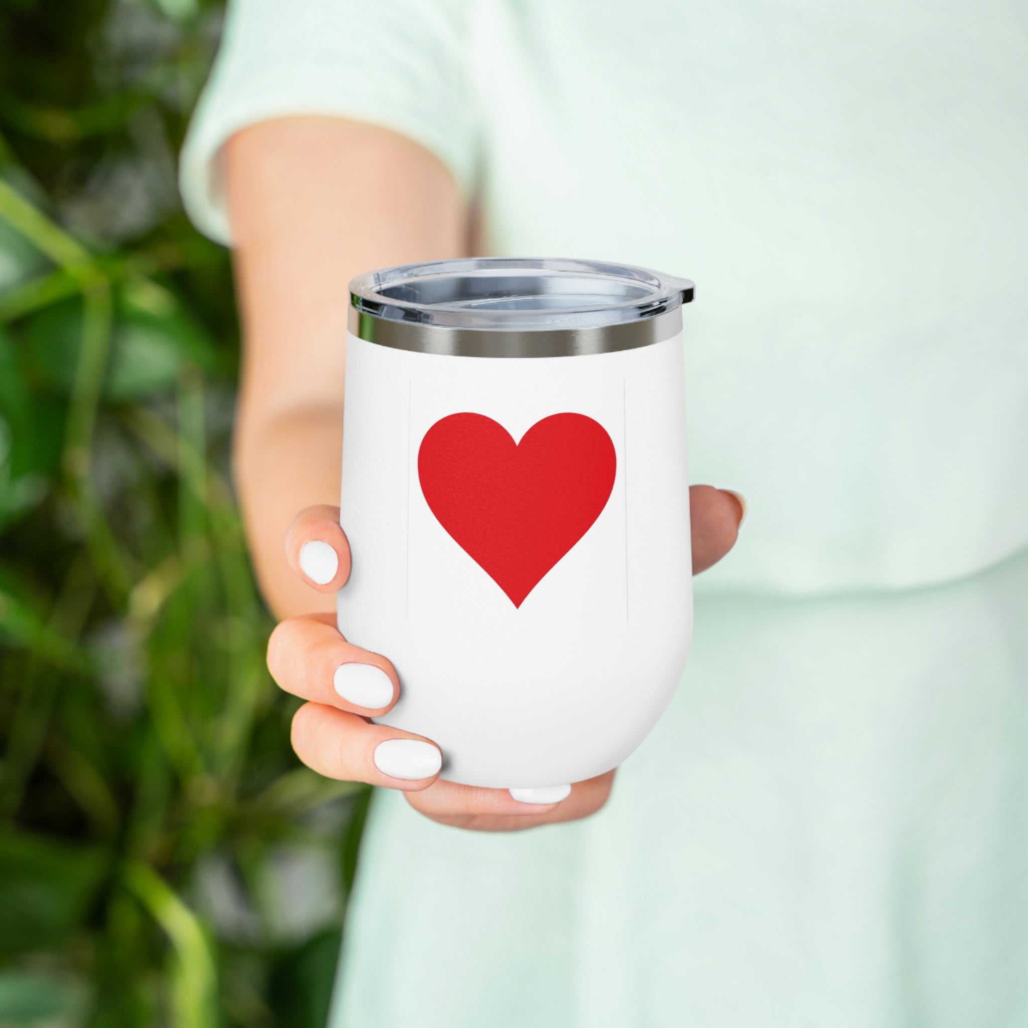 Hearts Wine Tumbler in stainless steel with a clear plastic lid, showcasing a stylish design perfect for hot and cold beverages.