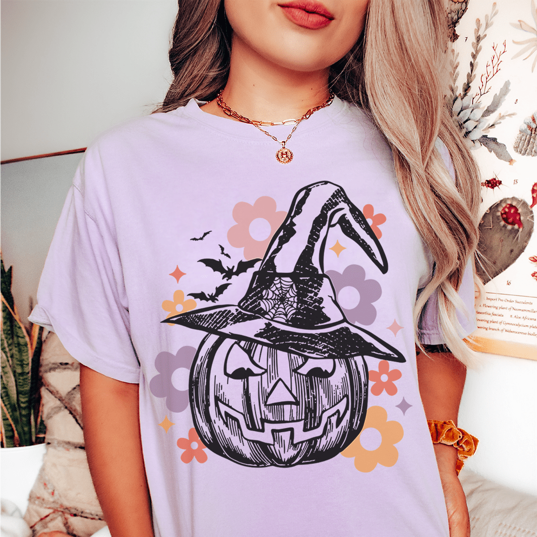 A soft, comfortable Hippie Pumpkin t-shirt made from 100% ring-spun cotton, featuring vibrant DTG printing and durable double stitching.