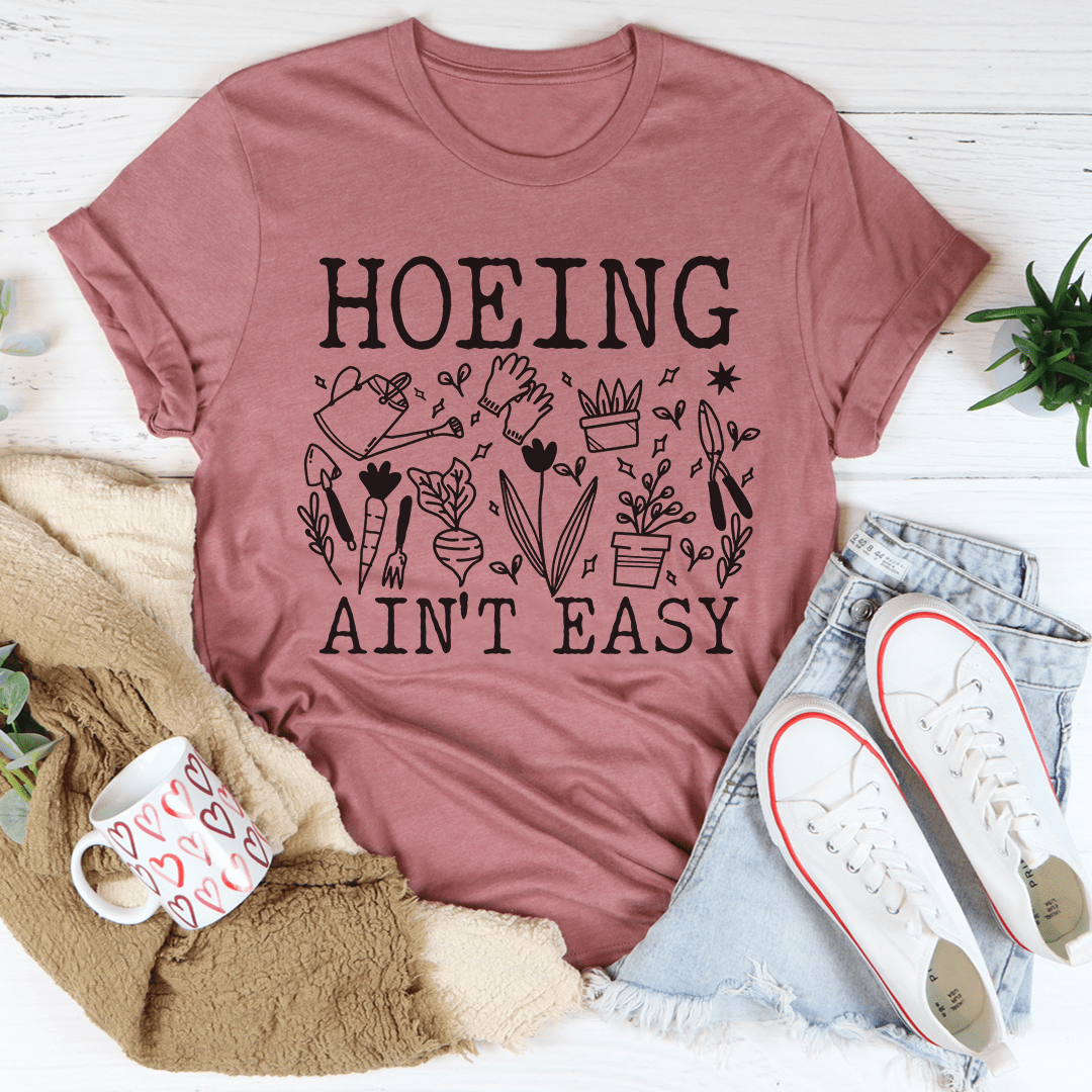 Hoeing Ain't Easy T-Shirt made of soft ring-spun cotton, featuring double stitching for durability, available in various sizes.