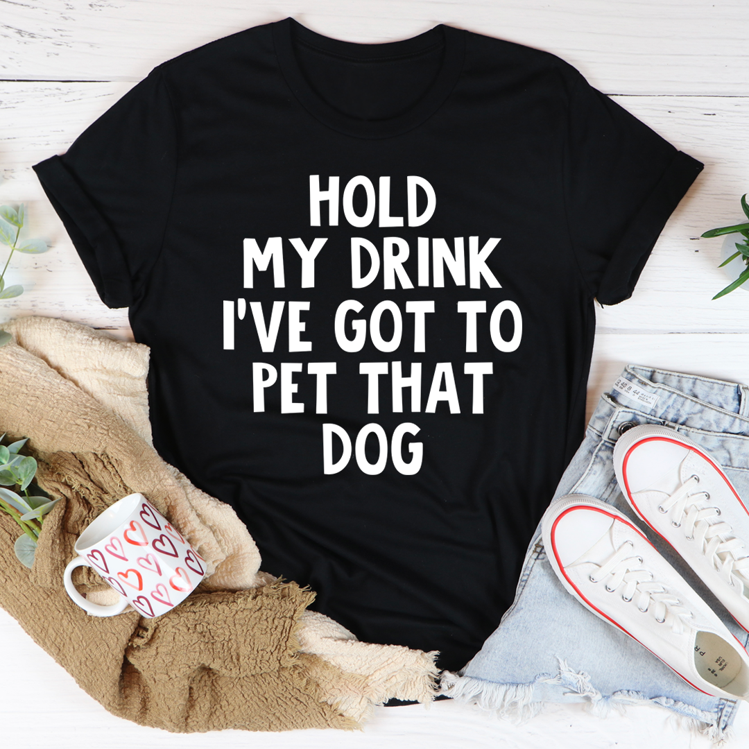 A comfortable Hold My Drink I've Got To Pet That Dog T-Shirt made from soft cotton, featuring a playful dog-themed graphic.