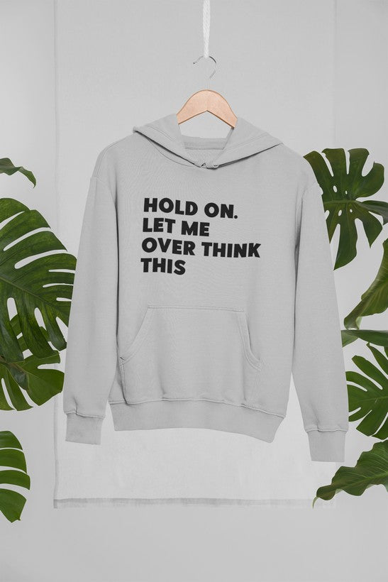 A stylish hoodie featuring the phrase 'Hold On Let Me Overthink This', designed by top artists, showcasing a cozy fleece material.