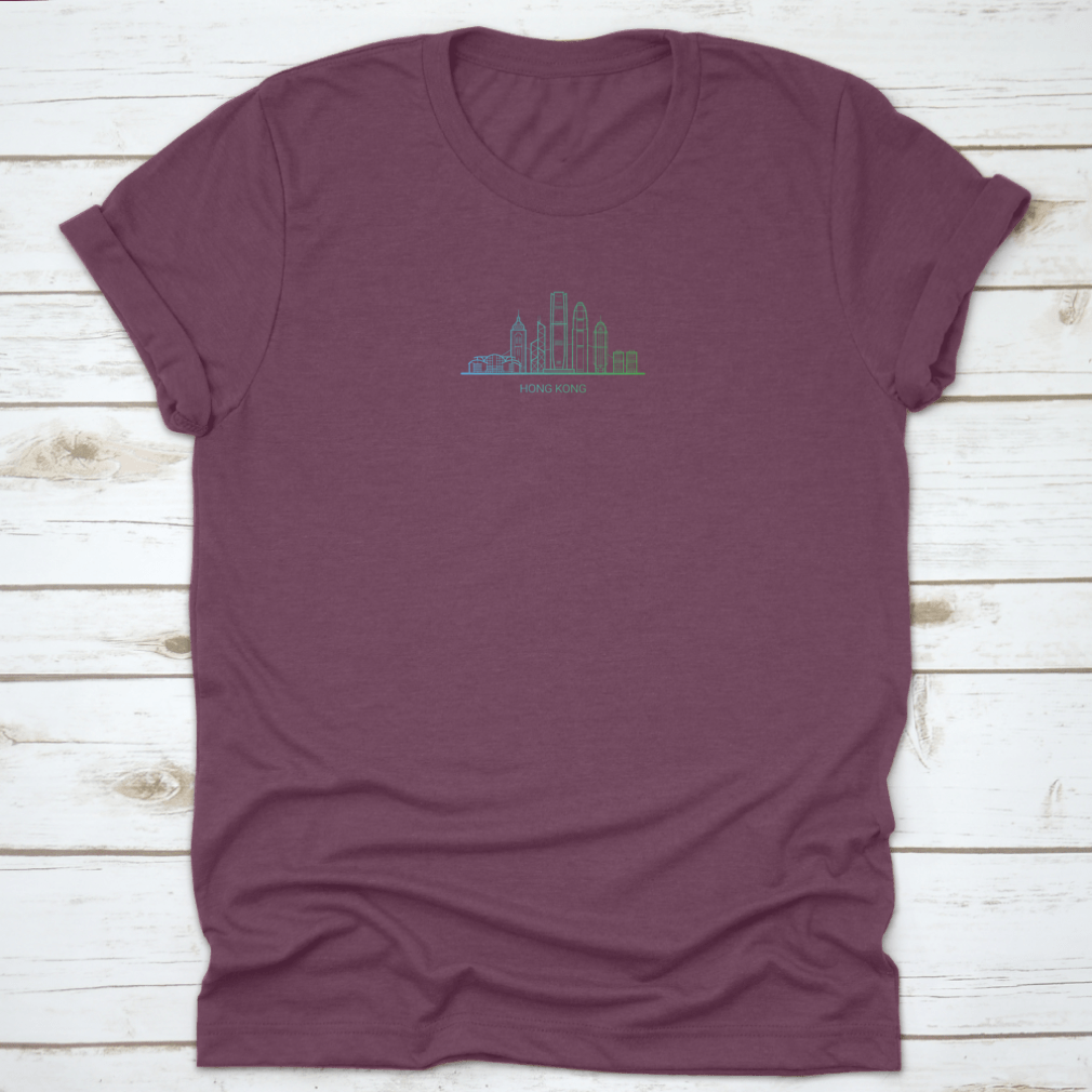 A stylish cotton t-shirt featuring a colorful gradient line art of Hong Kong's skyline, showcasing iconic buildings.