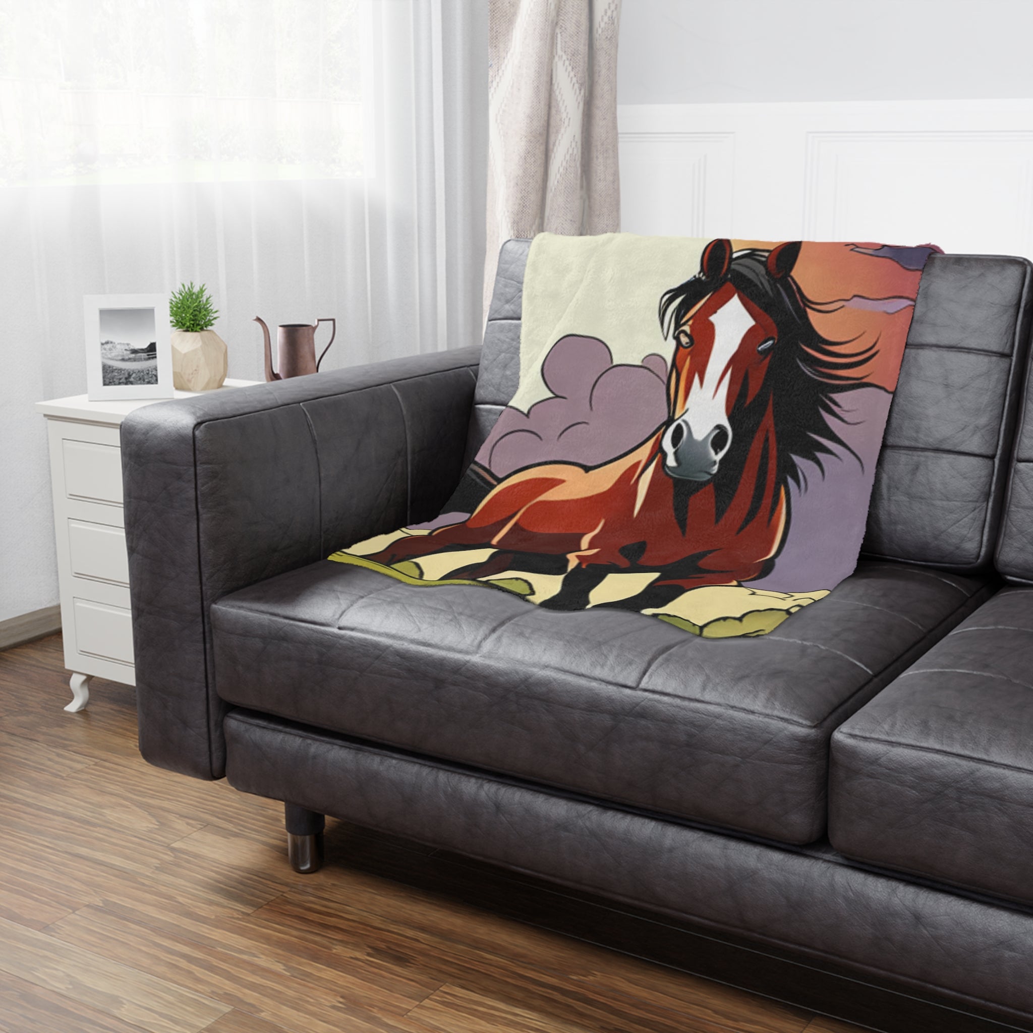 A soft micro-fleece minky blanket featuring a vibrant print of horses grazing in lush green grass, showcasing its luxurious texture.