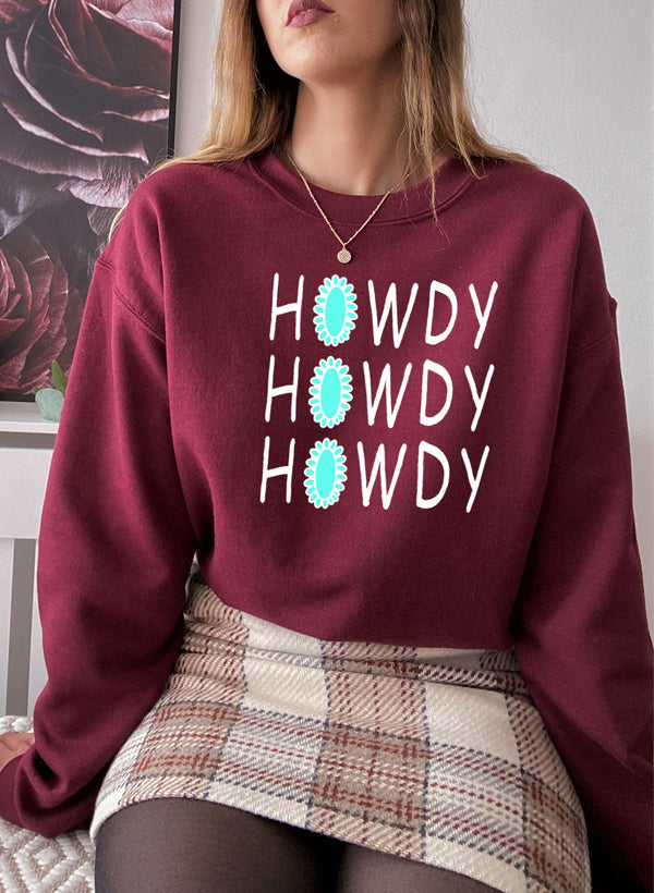 A cozy Howdy Sweat Shirt featuring unique artistic designs, made from a soft cotton/poly fleece blend.