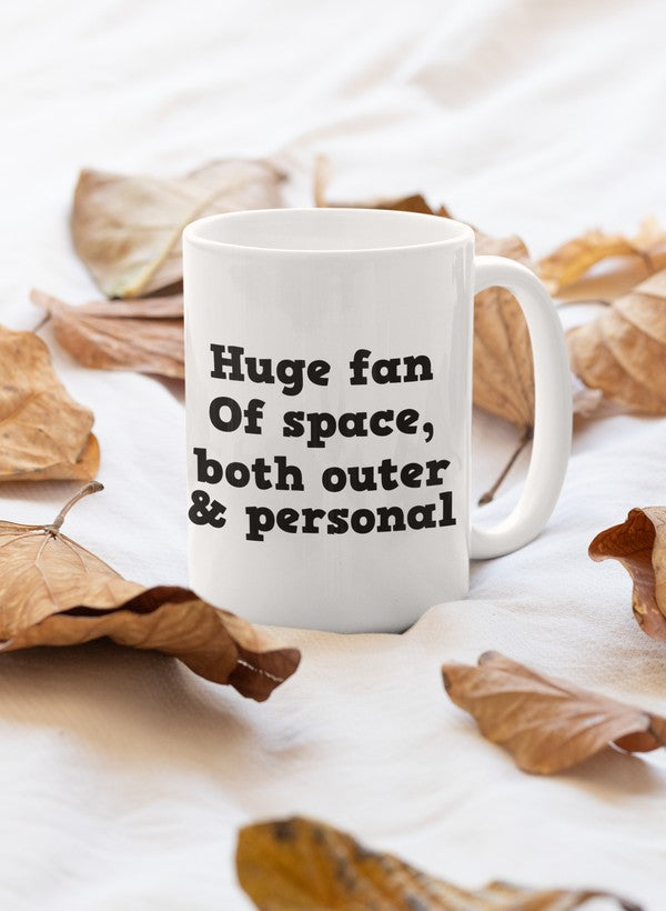 A high-quality 11oz ceramic mug featuring a space-themed design with a glossy finish and sturdy handle.