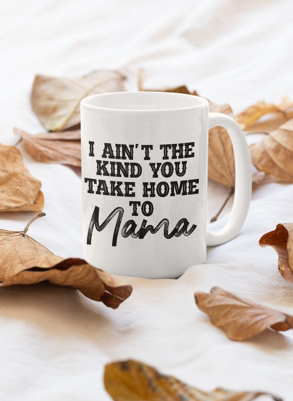 I Ain't The Kind You Take Home To Mama Mug with a glossy finish and sturdy handle, showcasing a humorous phrase.