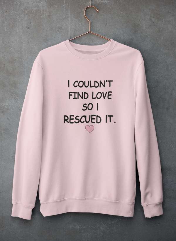 Cozy sweatshirt featuring the phrase 'I Couldn't Find Love So I Rescued It', made from a soft cotton/poly fleece blend.