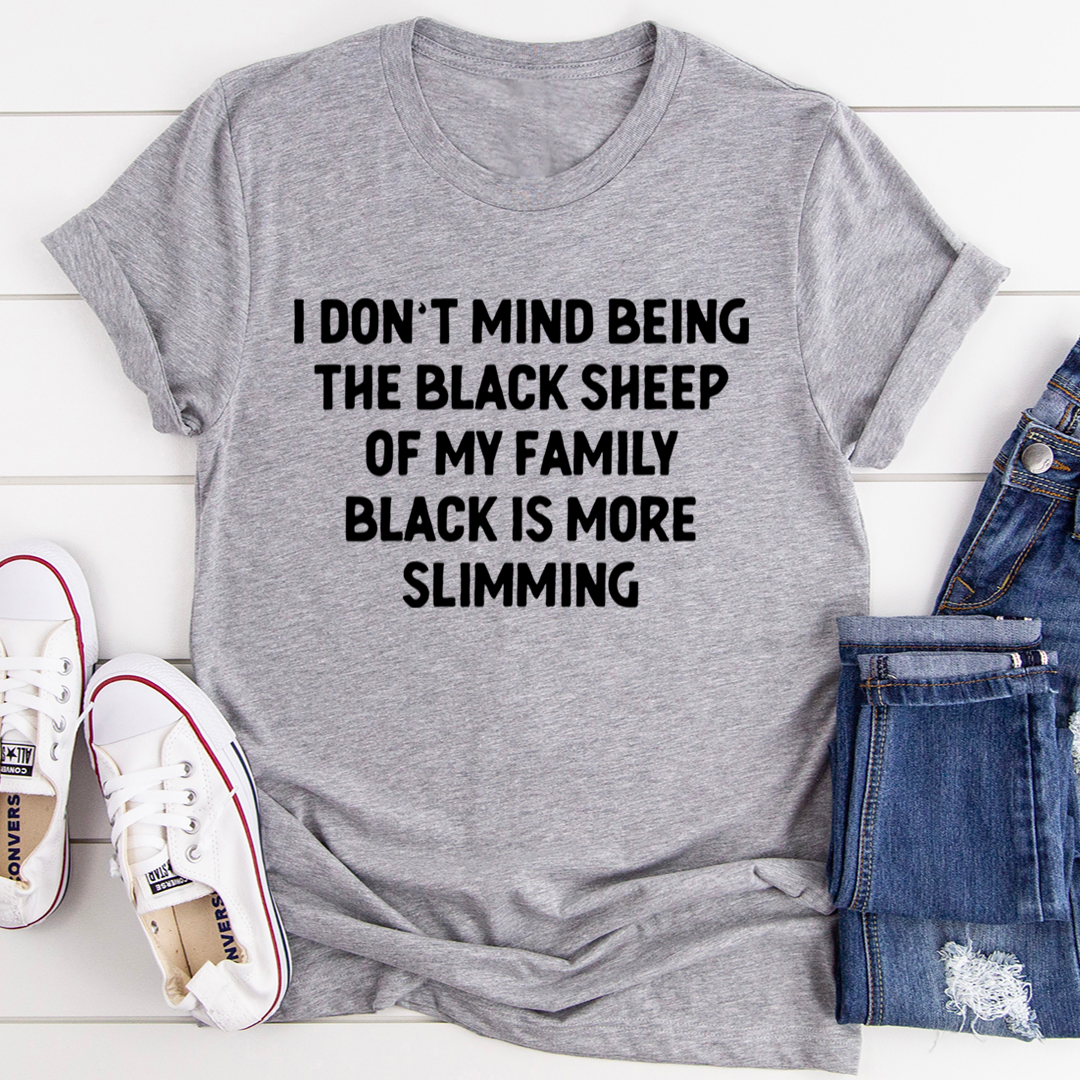 Black t-shirt with the phrase 'I Don't Mind Being The Black Sheep Of My Family' printed on it, showcasing a casual and stylish design.