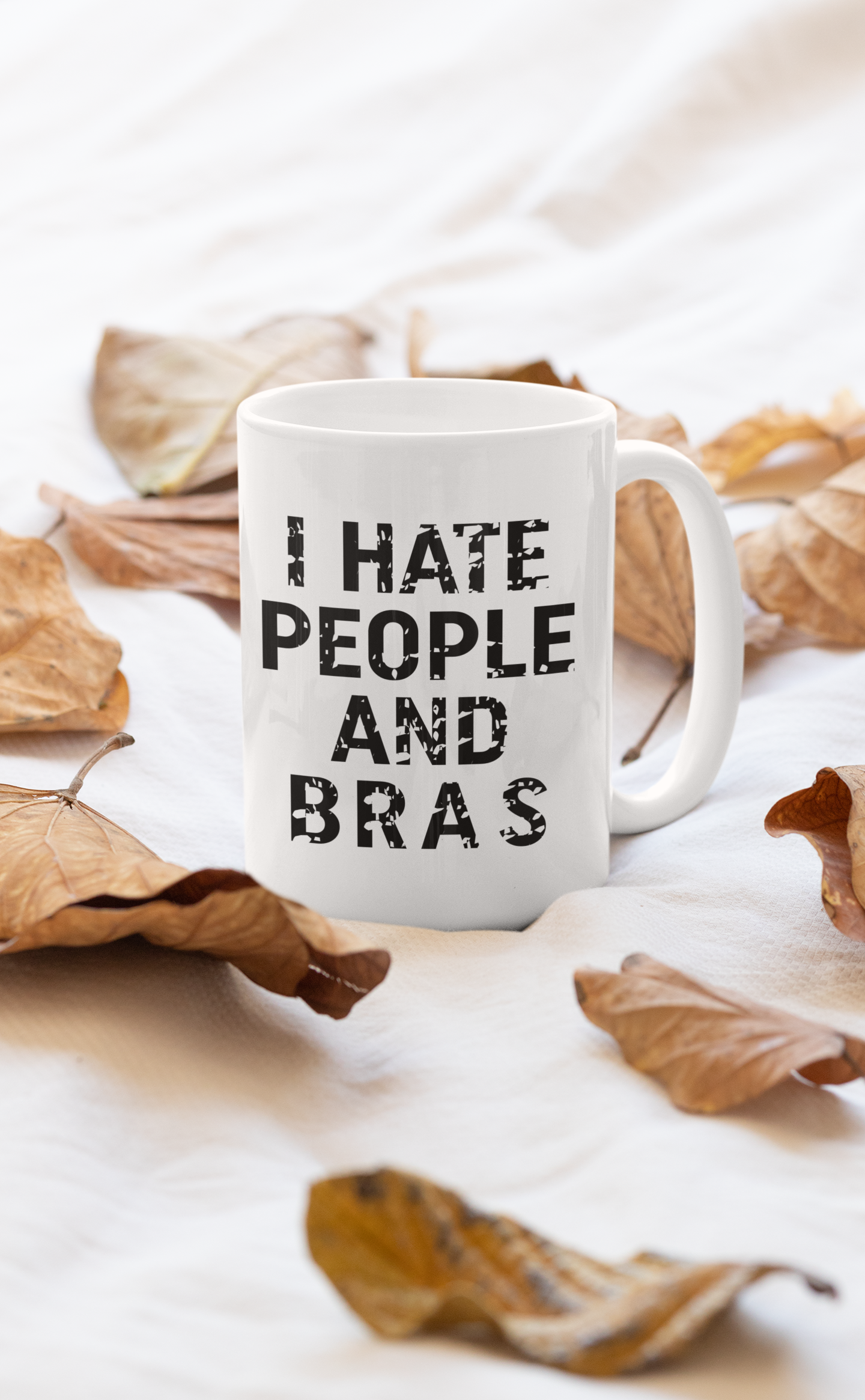 I Hate People And Bras Mug with glossy finish and sturdy handle, showcasing a humorous design.