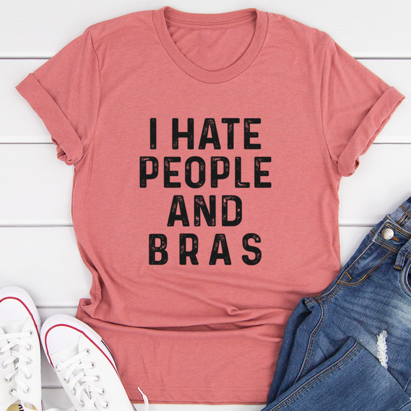 I Hate People And Bras T-Shirt displayed on a mannequin, showcasing its soft cotton fabric and bold printed design.