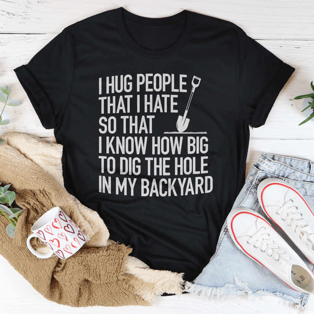 I Hug People That I Hate T-Shirt displayed on a mannequin, showcasing its soft cotton fabric and humorous design.