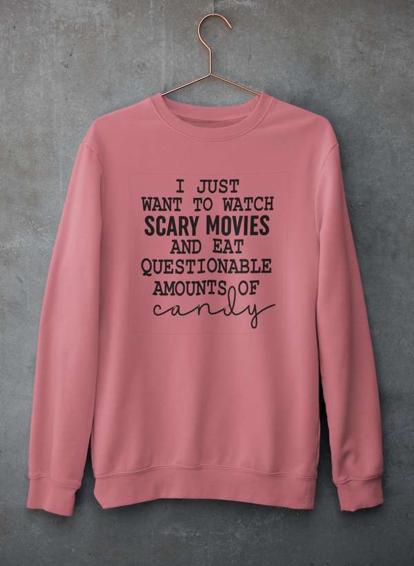 Cozy sweatshirt featuring the phrase 'I Just Want To Watch Scary Movies And Eat Candy', perfect for movie nights.