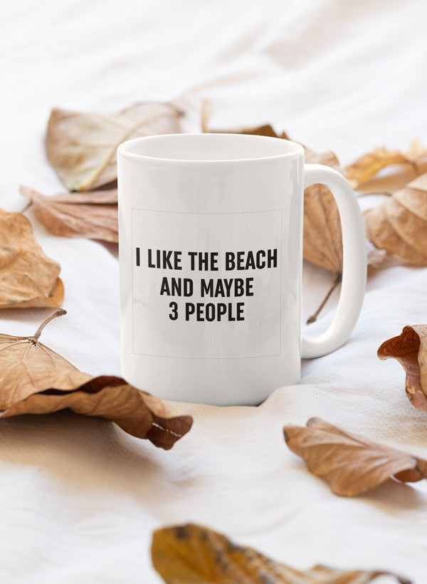 A stylish 11oz ceramic mug with a glossy finish, featuring the phrase 'I Like The Beach And Maybe', perfect for beach lovers.