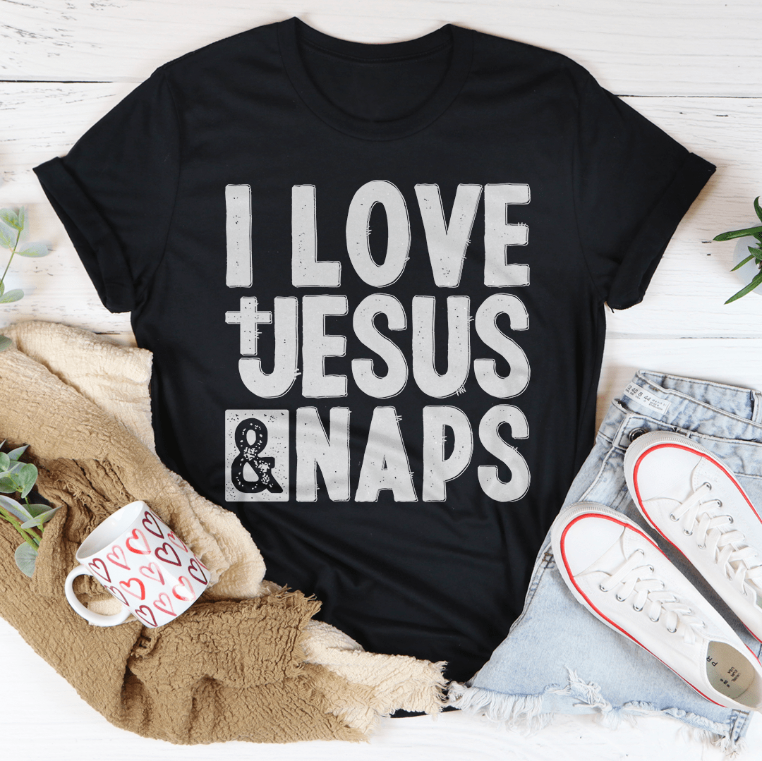 I Love Jesus & Naps T-Shirt displayed on a hanger, showcasing its soft fabric and vibrant print.