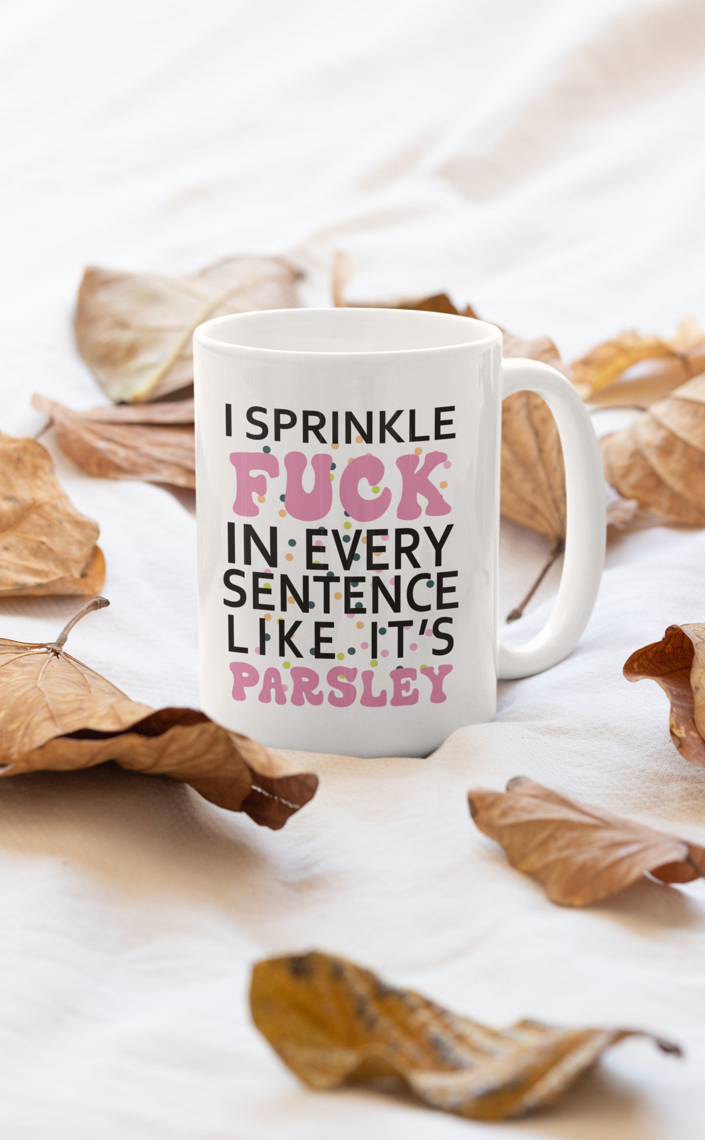 A stylish 11oz ceramic mug with a humorous design that reads 'I Sprinkle The F-Bomb In', featuring a glossy finish and sturdy handle.