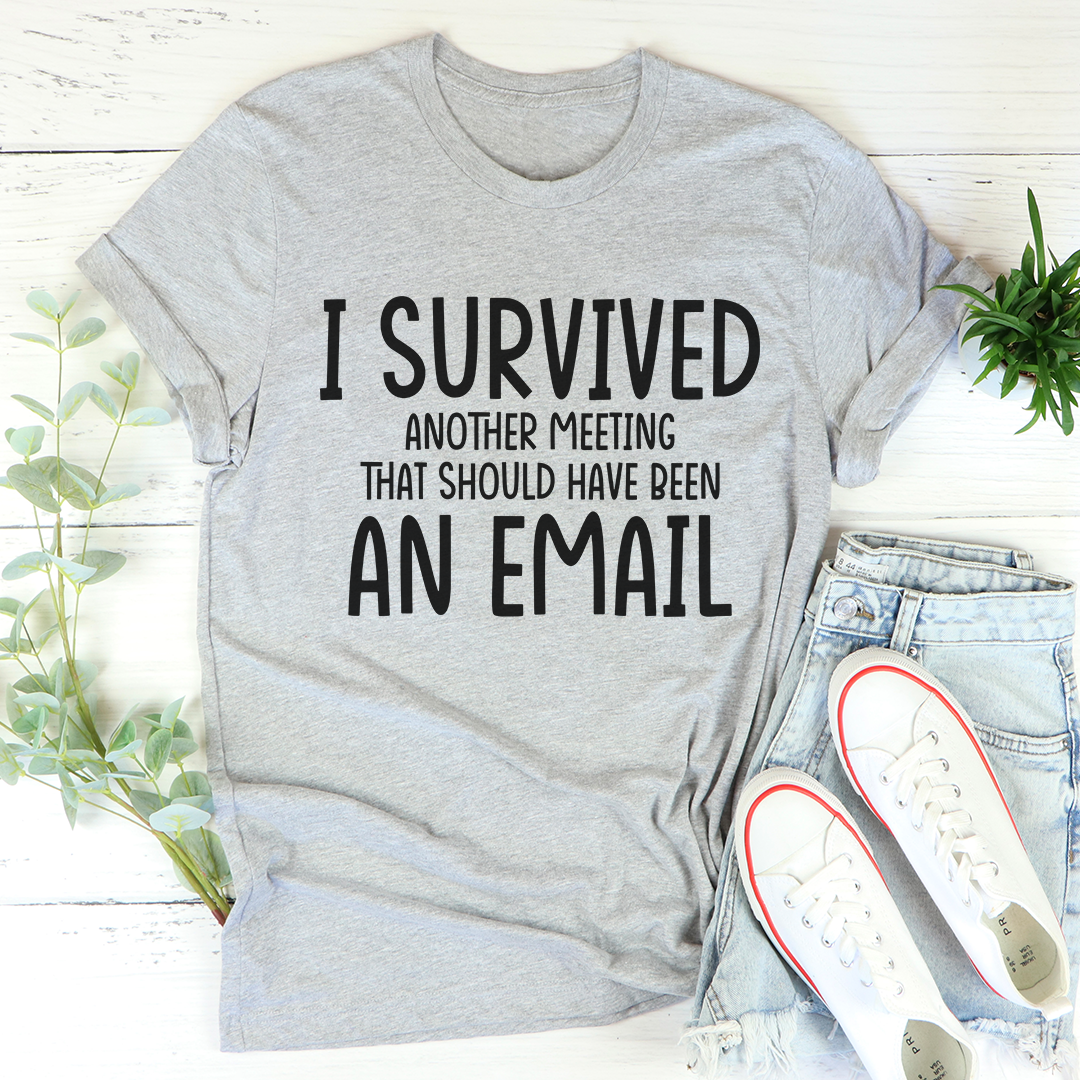 I Survived Another Meeting T-Shirt in soft cotton, featuring double stitching and humorous print.