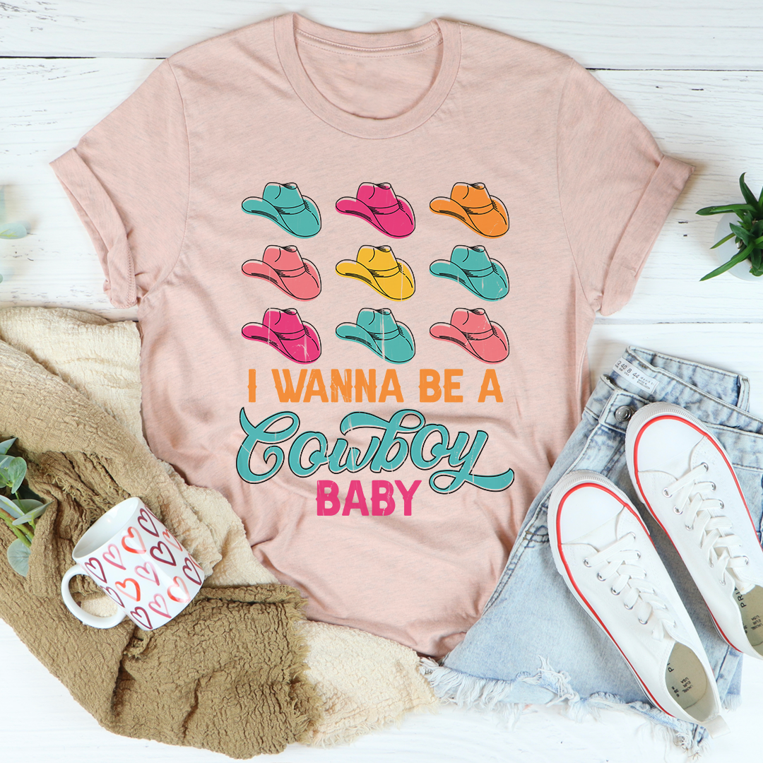 I Wanna Be A Cowboy Baby T-Shirt featuring a vibrant design on soft cotton fabric, perfect for casual wear.