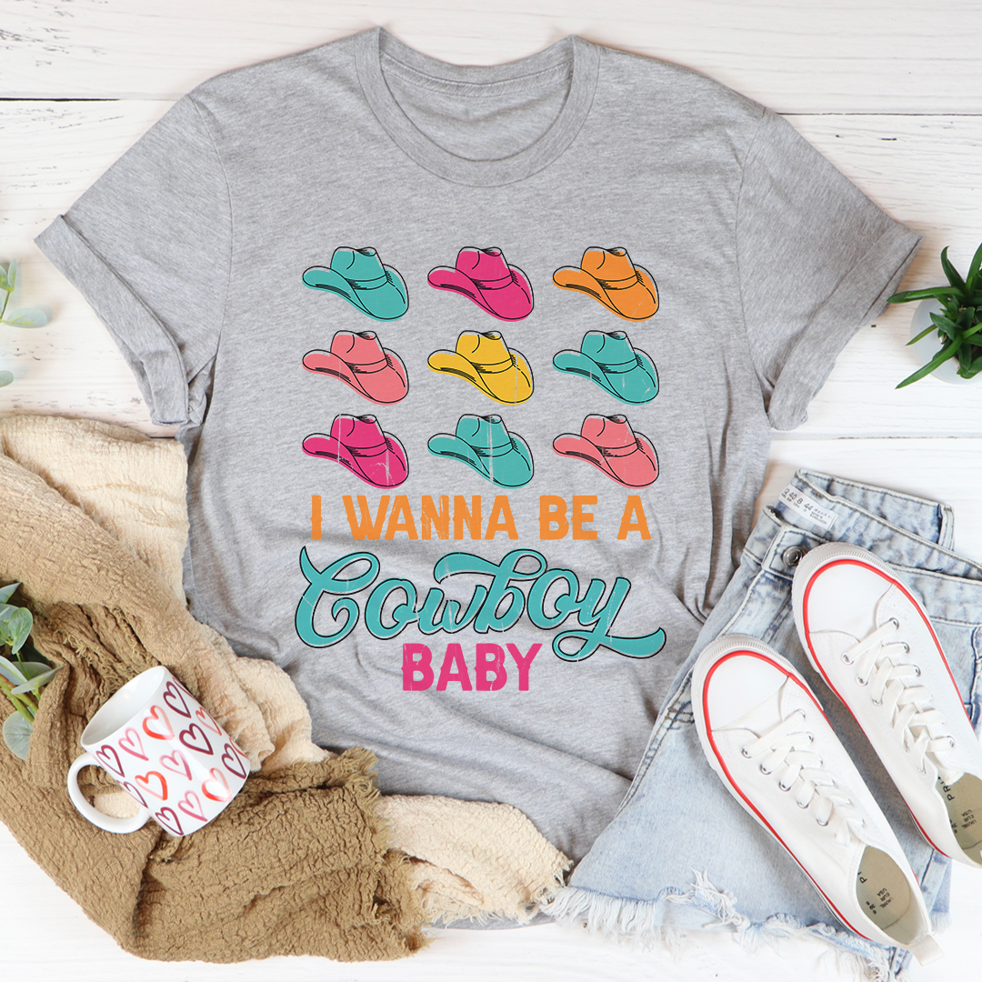 I Wanna Be A Cowboy Baby T-Shirt featuring a vibrant design on soft cotton fabric, perfect for casual wear.