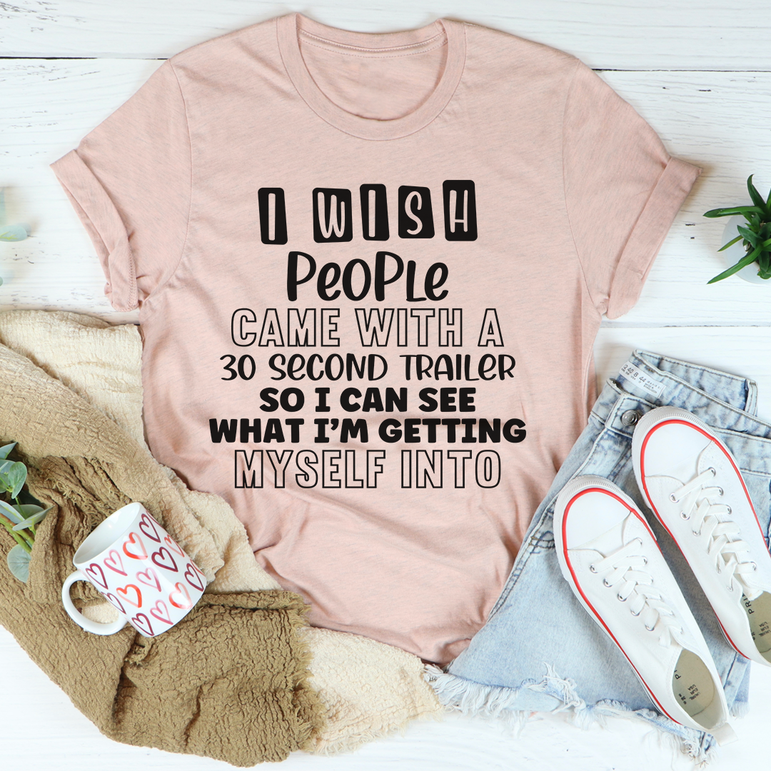 I Wish People Came With A 30 Second Trailer T-Shirt displayed on a mannequin, showcasing its soft cotton fabric and humorous design.