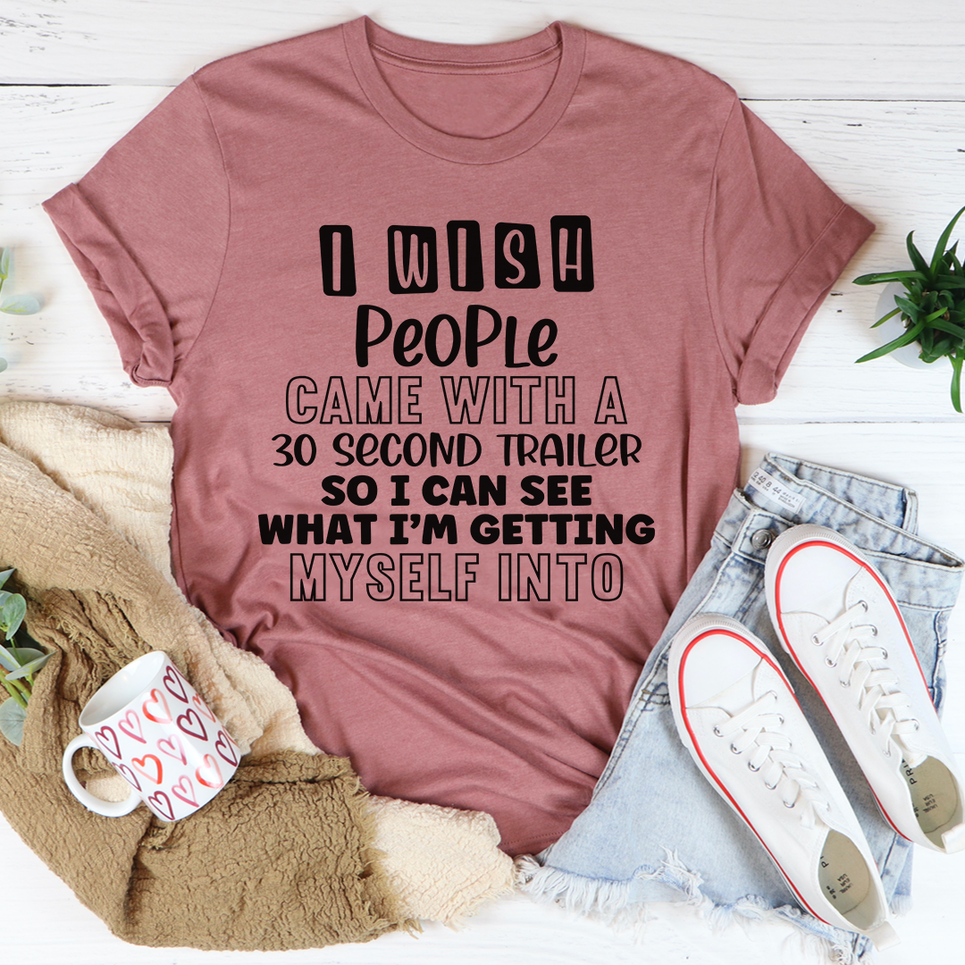 I Wish People Came With A 30 Second Trailer T-Shirt displayed on a mannequin, showcasing its soft cotton fabric and humorous design.