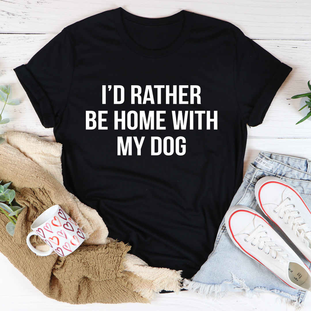 A comfortable and stylish t-shirt featuring the phrase 'I'd Rather Be Home With My Dog', made from soft ring-spun cotton.