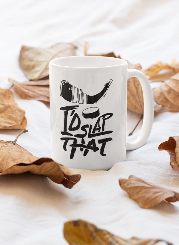 A stylish 11oz ceramic mug with a humorous design saying 'I'd Slap That', featuring a glossy finish and sturdy handle.