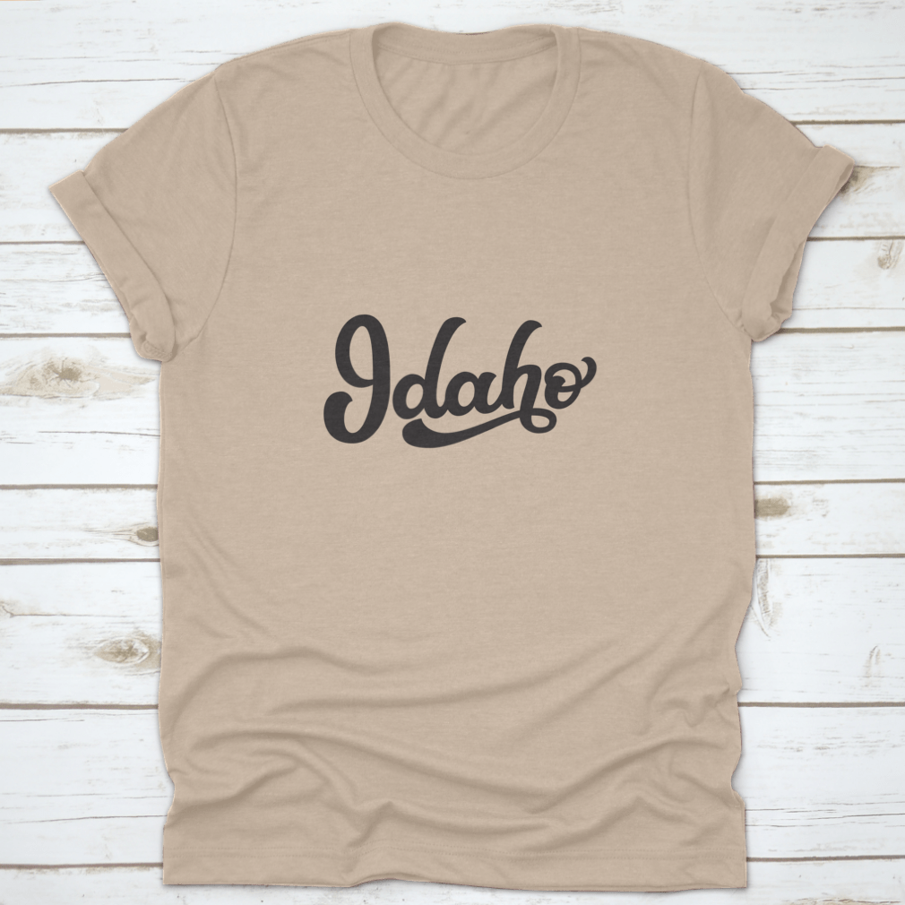 Idaho Hand Drawn US State Tee on a white background, showcasing its unique design and quality fabric.