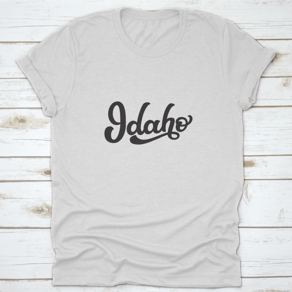 Idaho Hand Drawn US State Tee on a white background, showcasing its unique design and quality fabric.