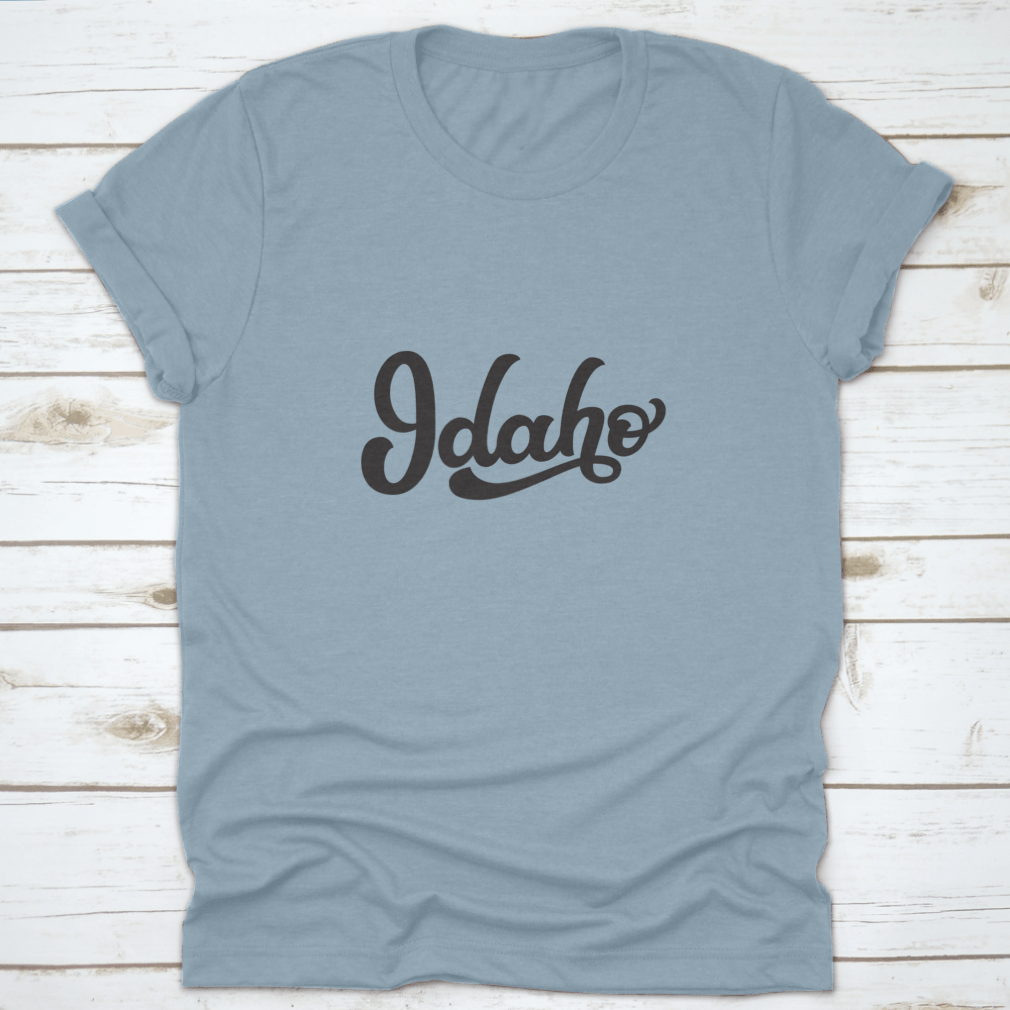 Idaho Hand Drawn US State Tee on a white background, showcasing its unique design and quality fabric.