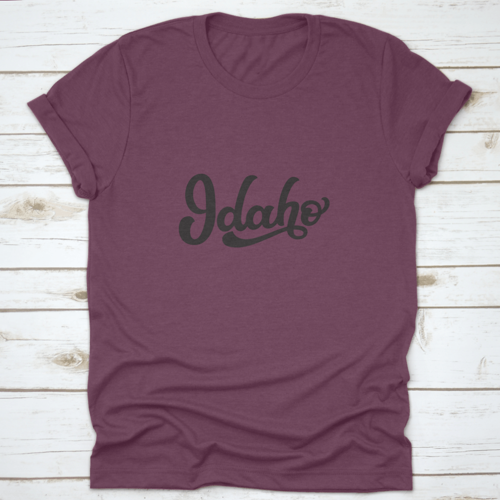 Idaho Hand Drawn US State Tee on a white background, showcasing its unique design and quality fabric.