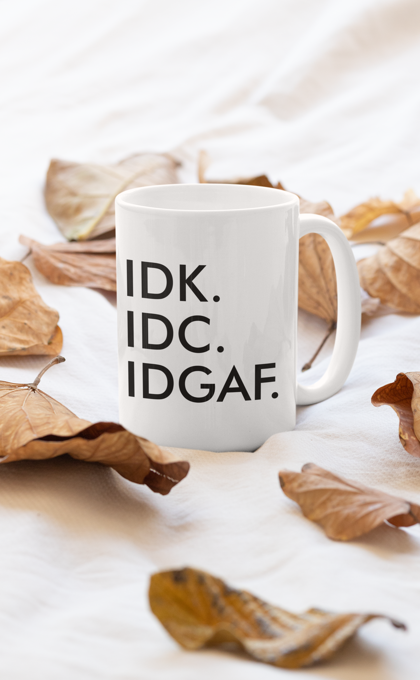 IDK IDC IDGAF Mug with glossy finish and sturdy handle, featuring a bold design for coffee lovers.