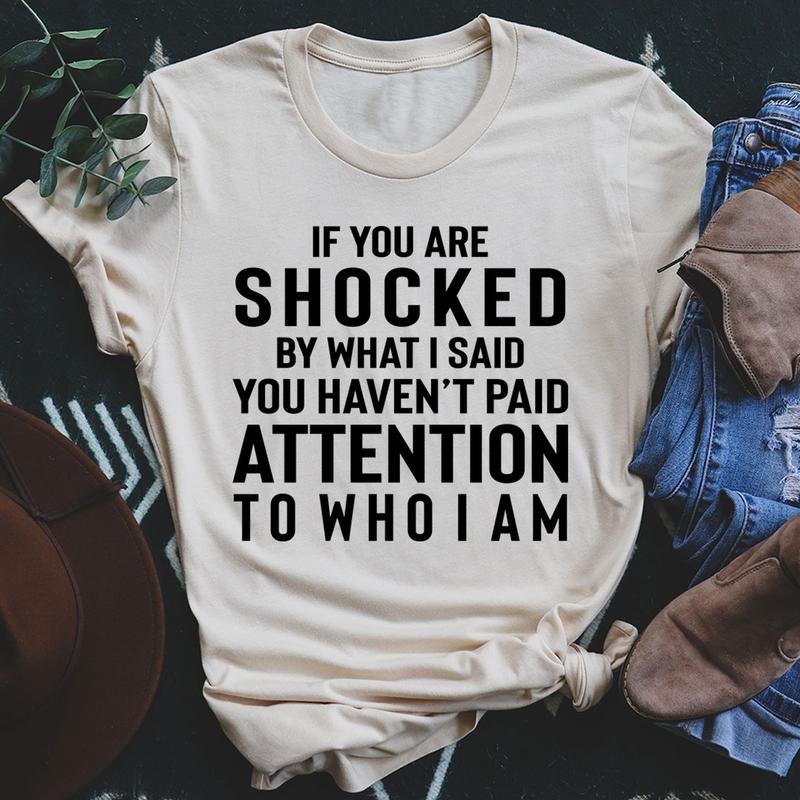 A stylish t-shirt featuring the phrase 'If You Are Shocked By What I Said', made from soft cotton with double stitching.