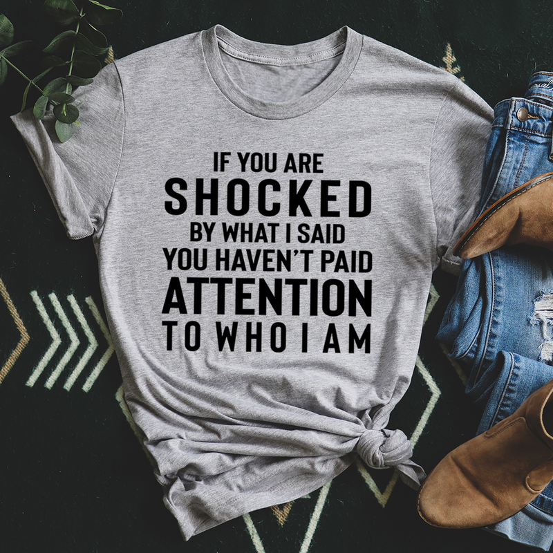 A stylish t-shirt featuring the phrase 'If You Are Shocked By What I Said', made from soft cotton with double stitching.