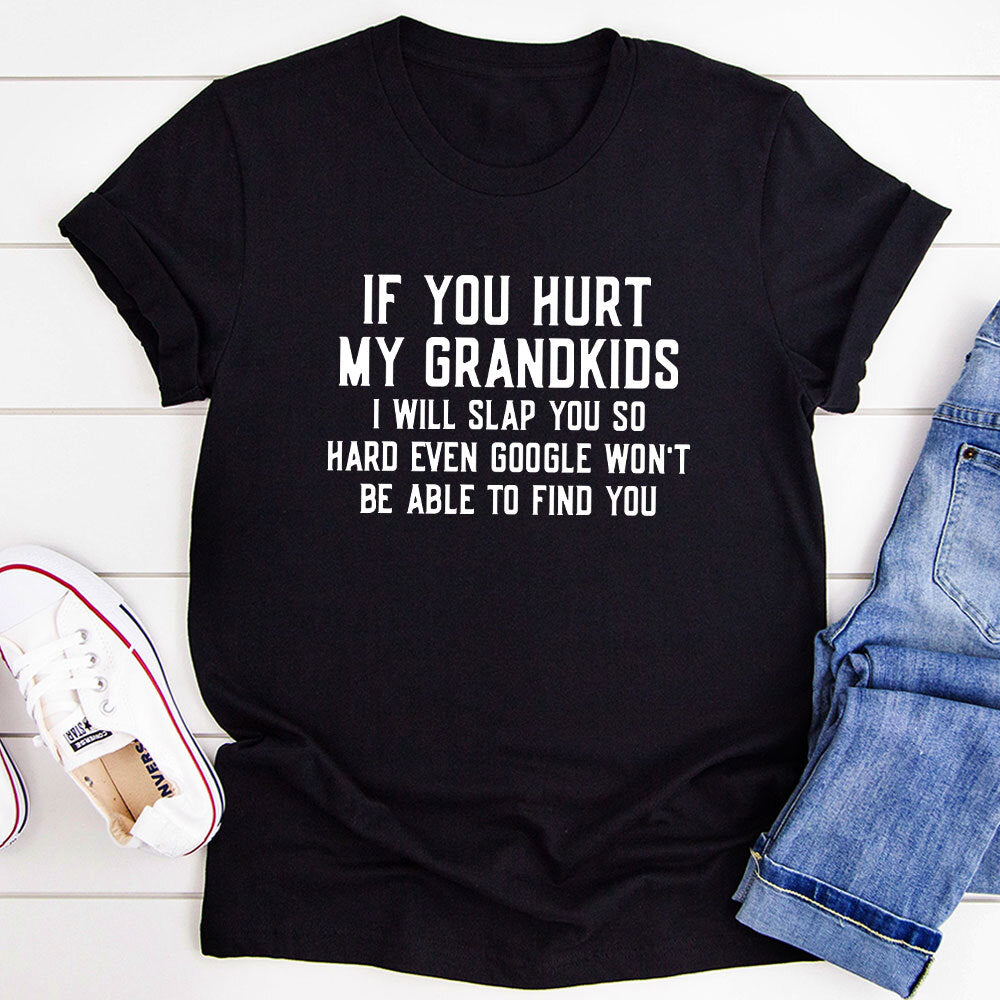 A comfortable t-shirt with the phrase 'If You Hurt My Grandkids' printed on it, showcasing a fun and loving design.