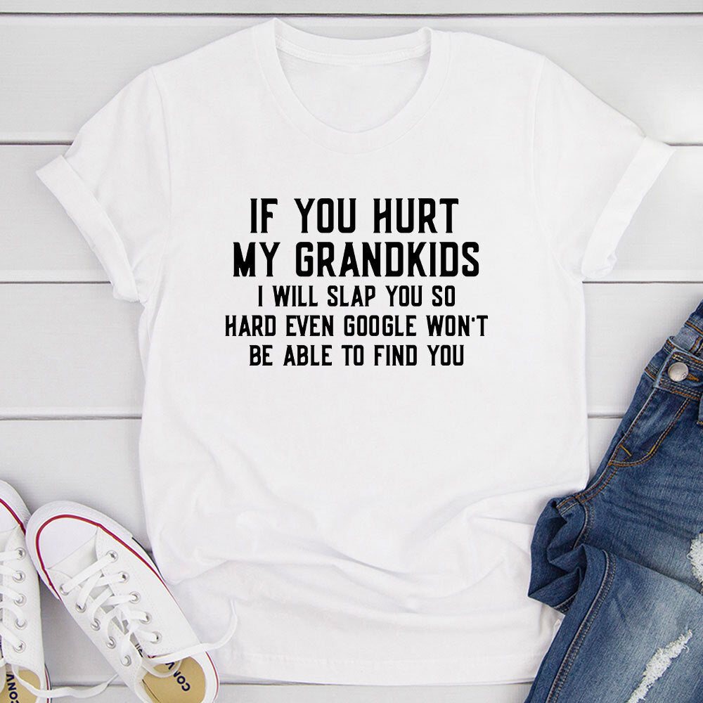 A comfortable t-shirt with the phrase 'If You Hurt My Grandkids' printed on it, showcasing a fun and loving design.