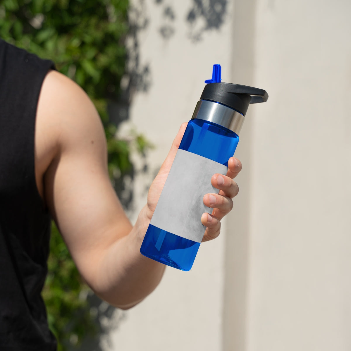 Illusion Kensington Tritan™ Sport Bottle, 20oz, showcasing its sleek design, carabiner hook, and spill-resistant lid.