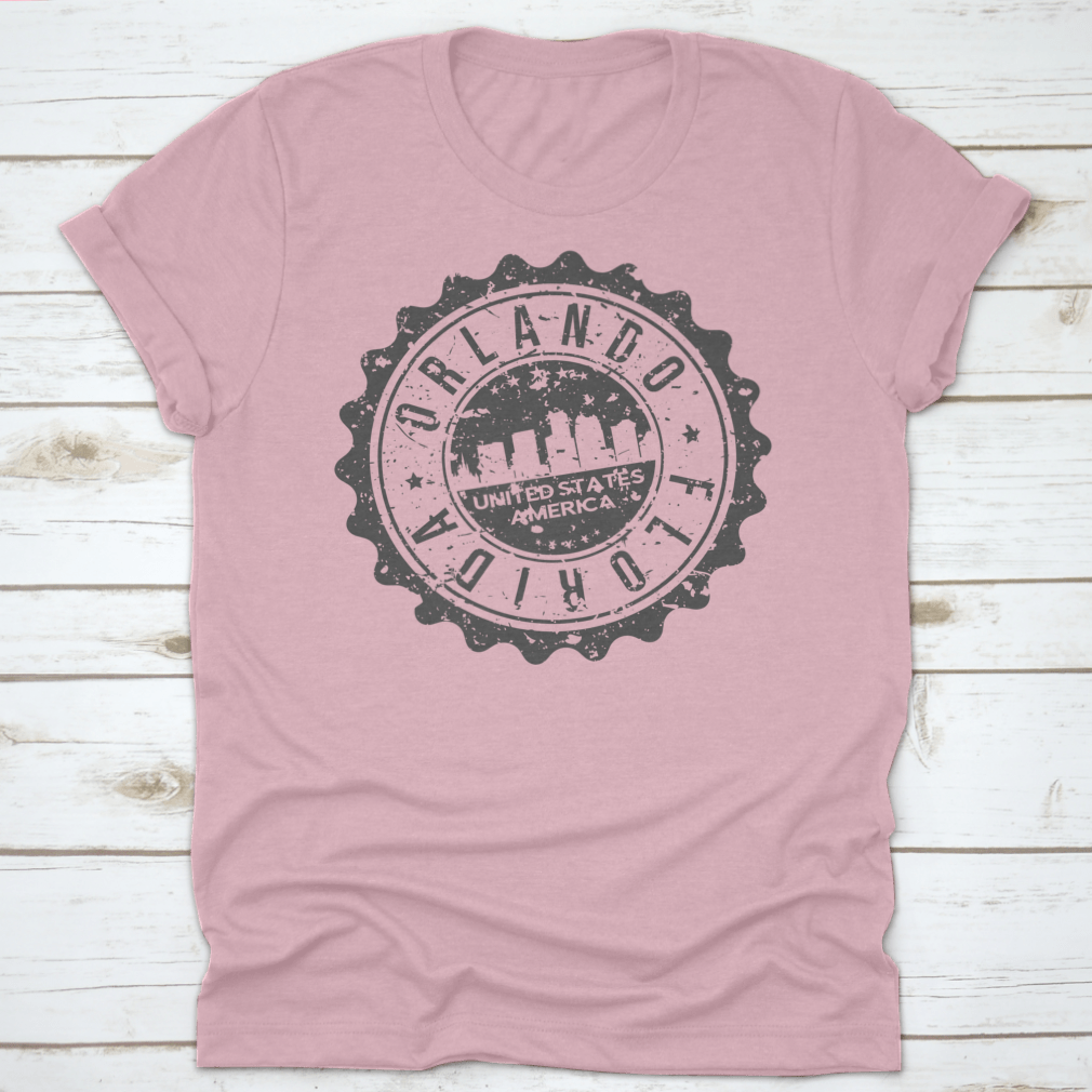 A stylish t-shirt featuring an illustration of Orlando, Florida's travel stamp icon, perfect for city tourism enthusiasts.