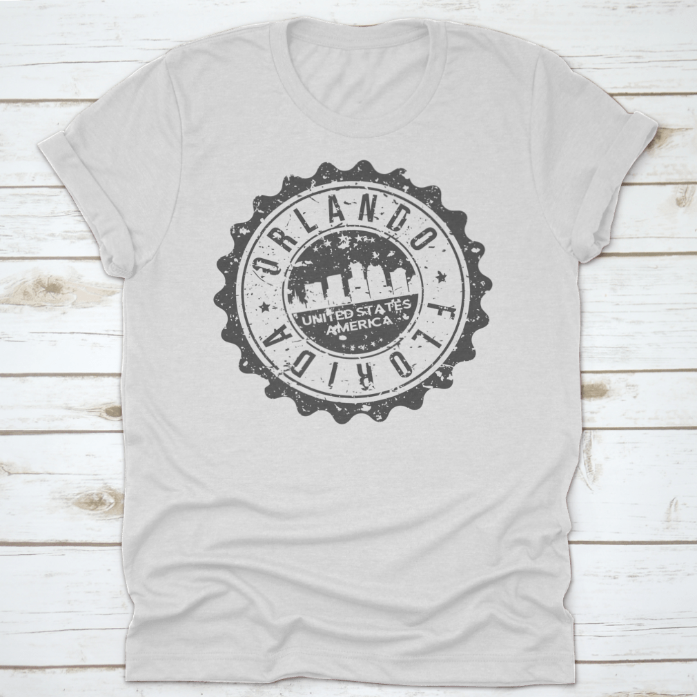 A stylish t-shirt featuring an illustration of Orlando, Florida's travel stamp icon, perfect for city tourism enthusiasts.