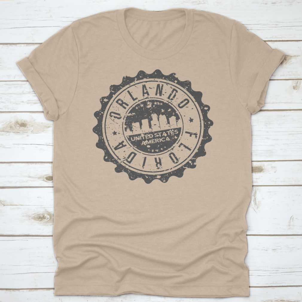 A stylish t-shirt featuring an illustration of Orlando, Florida's travel stamp icon, perfect for city tourism enthusiasts.