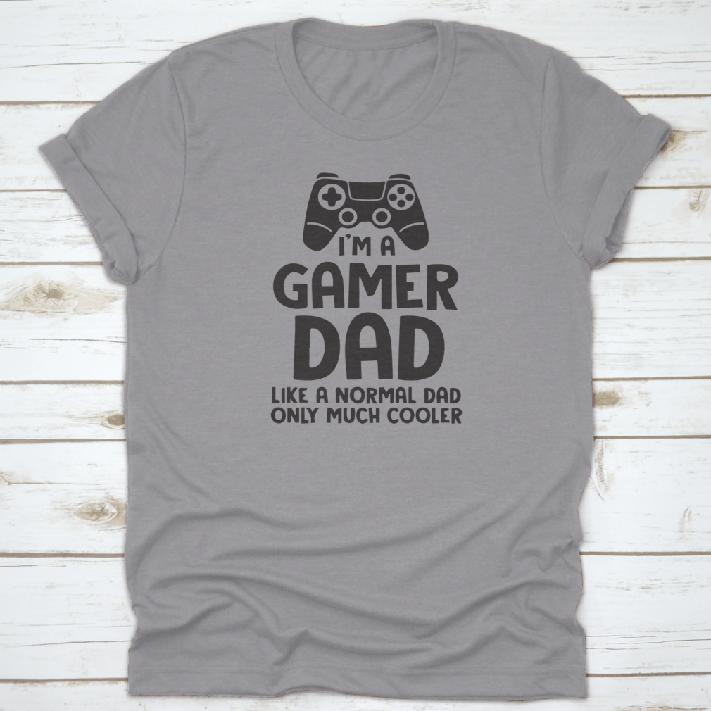 A stylish Gamer Dad logo t-shirt made from 100% cotton, featuring a cool and inspirational design perfect for gaming enthusiasts.