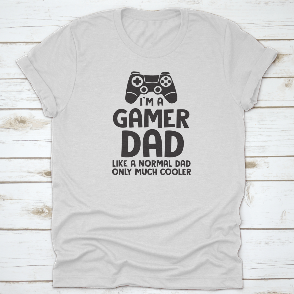 A stylish Gamer Dad logo t-shirt made from 100% cotton, featuring a cool and inspirational design perfect for gaming enthusiasts.