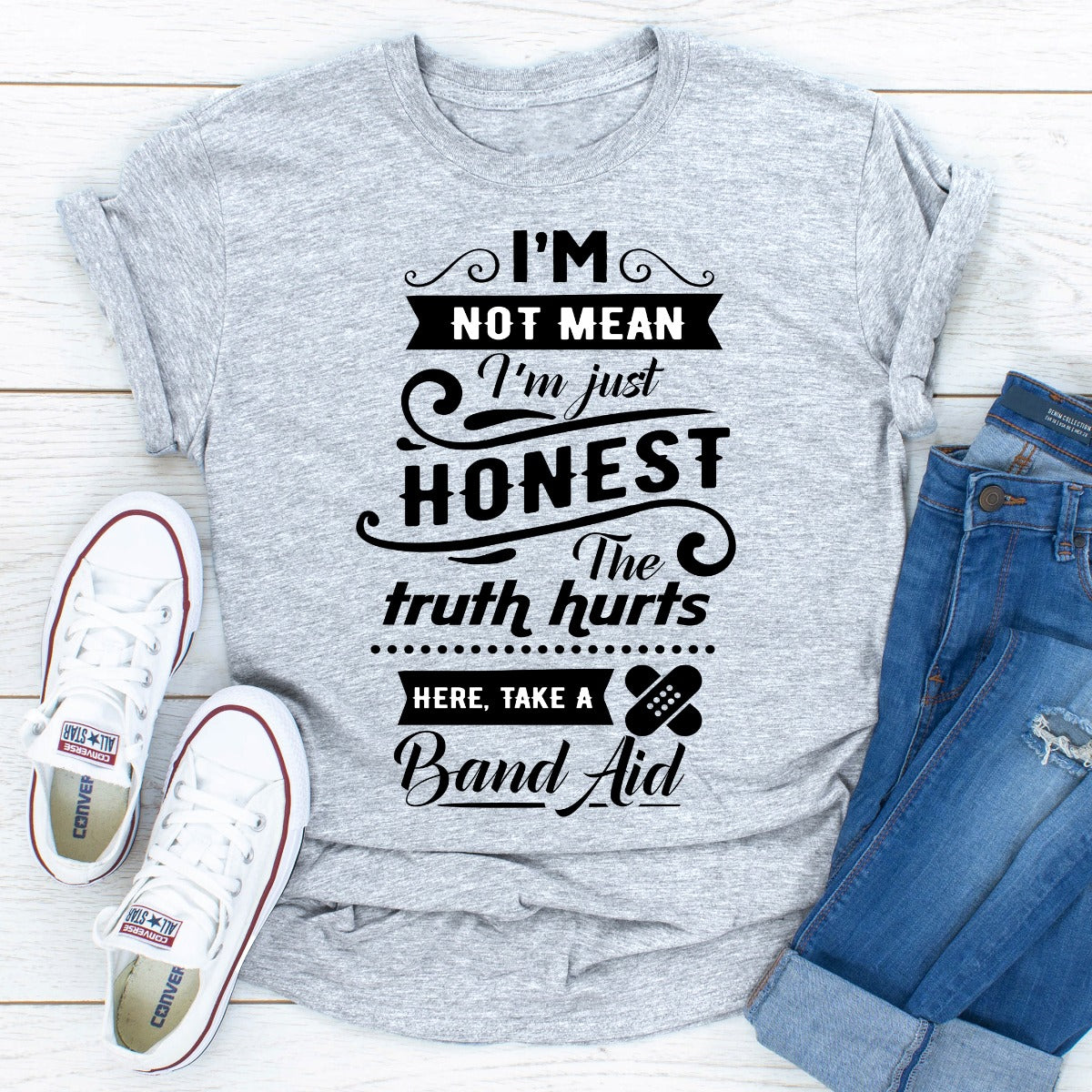 A soft and durable 'I'm Not Mean' T-Shirt made from ring-spun cotton, featuring double stitching on the neckline and sleeves.