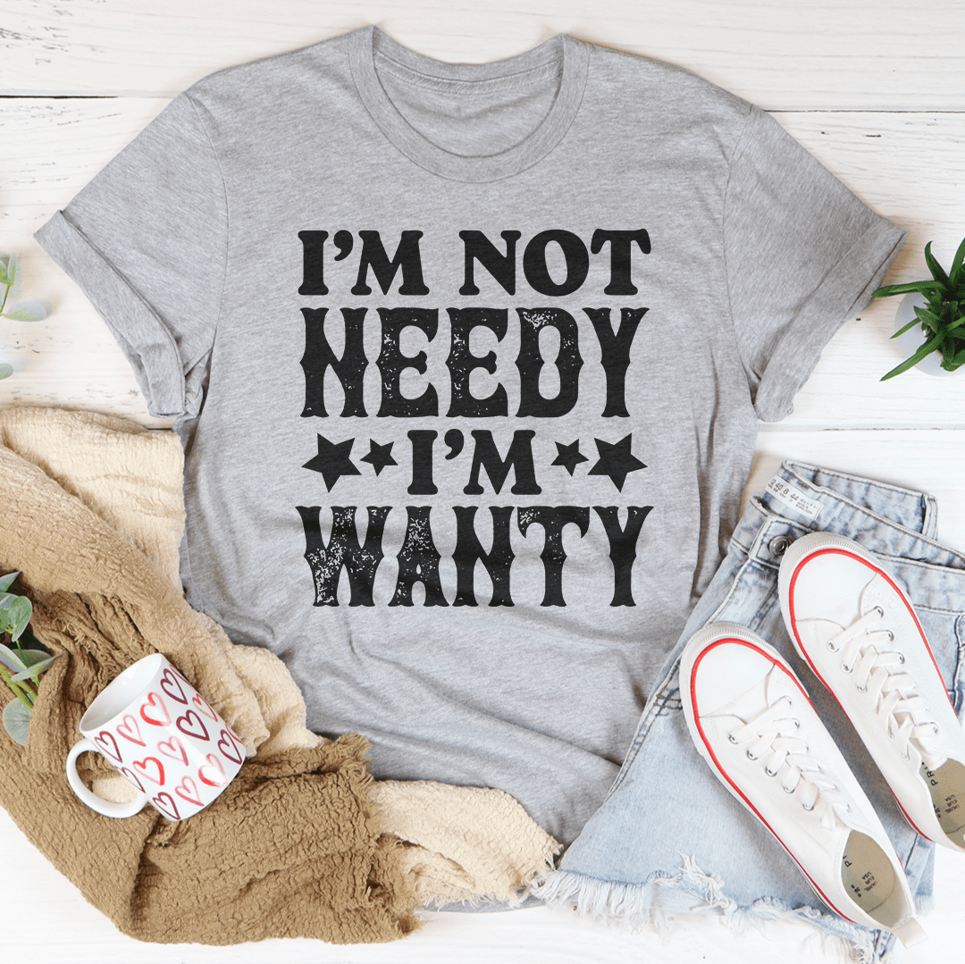 I'm Not Needy I'm Wanty T-Shirt displayed on a mannequin, showcasing its soft cotton fabric and humorous text design.