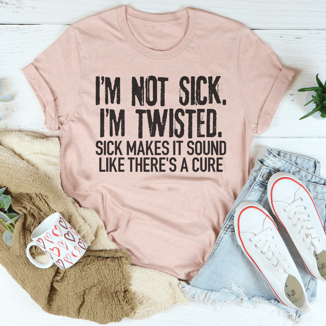 A stylish black t-shirt featuring the phrase 'I'm Not Sick I'm Twisted' in bold white letters, showcasing its soft fabric and durable stitching.