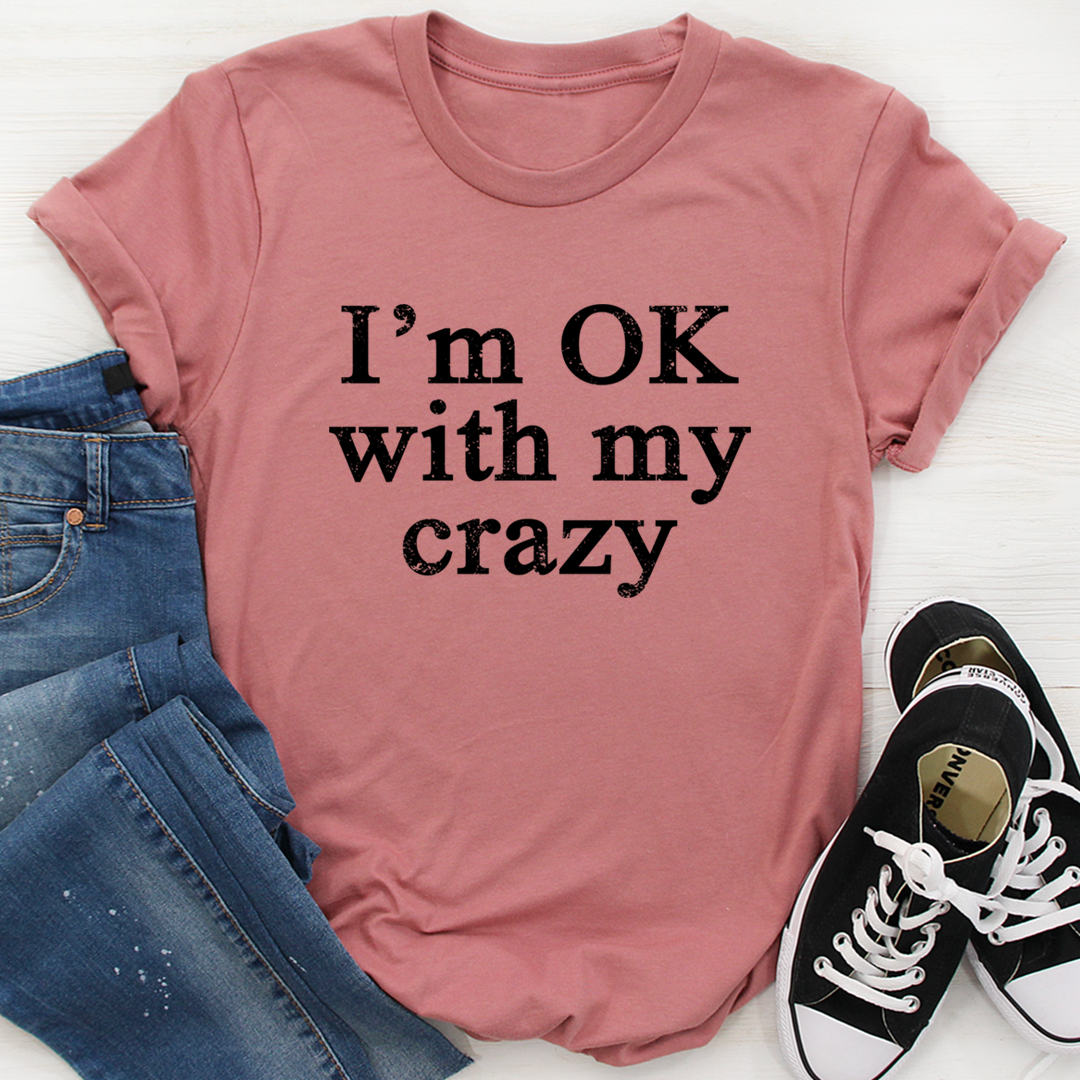 I'm OK With My Crazy T-Shirt displayed on a mannequin, showcasing its soft cotton fabric and vibrant print.