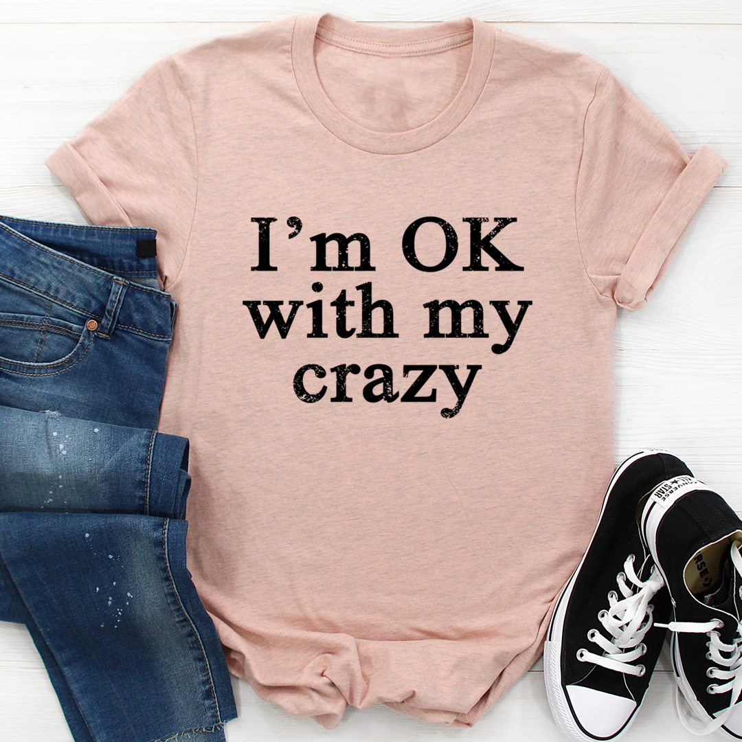 I'm OK With My Crazy T-Shirt displayed on a mannequin, showcasing its soft cotton fabric and vibrant print.